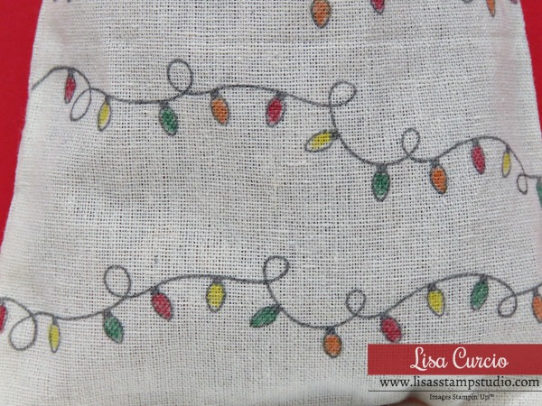 Video tutorial! Stamping & coloring on fabric bags. Stampin' Up! Santa Bags perfect for gift cards, too. Close up view.